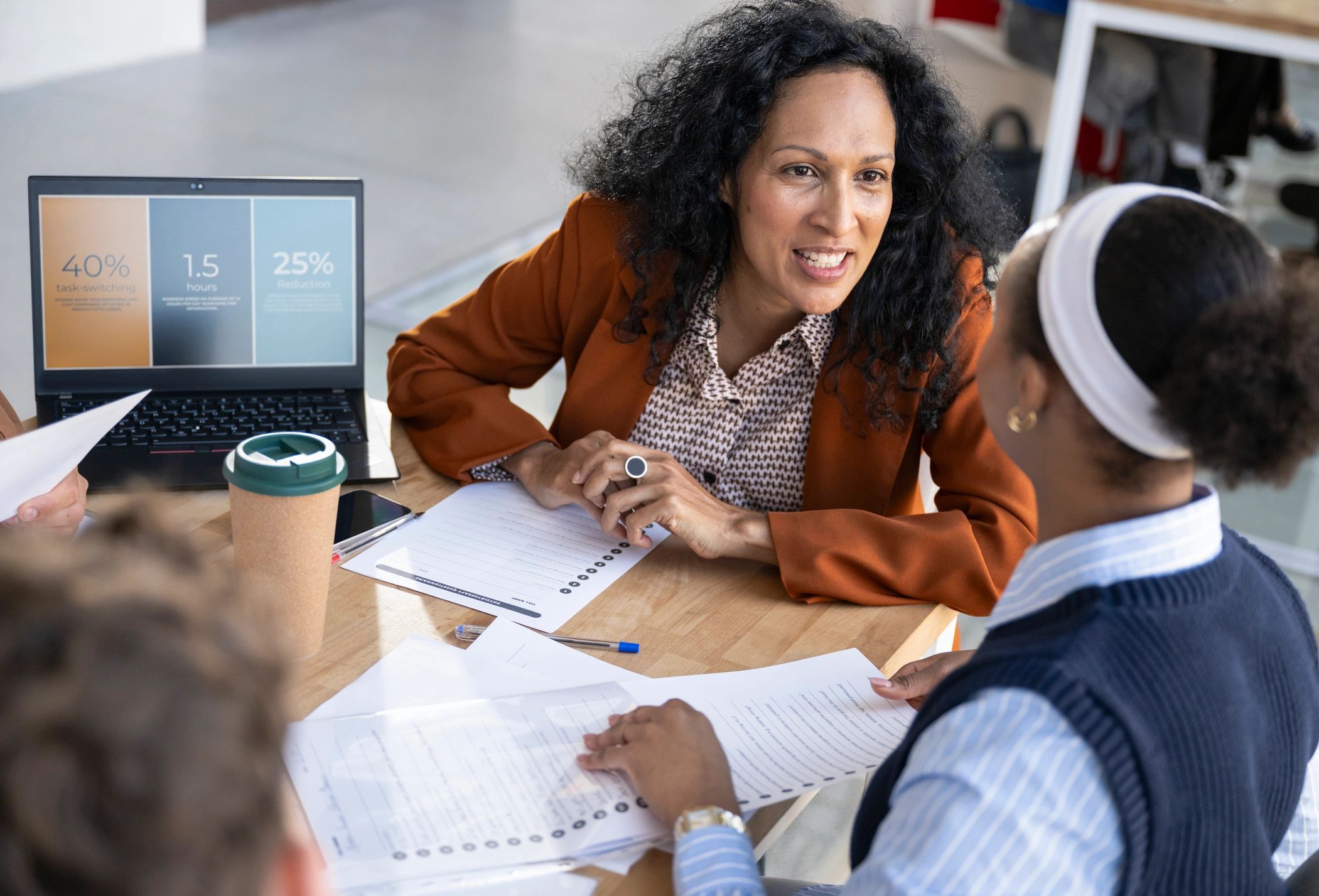 Diverse colleagues collaborating around a table